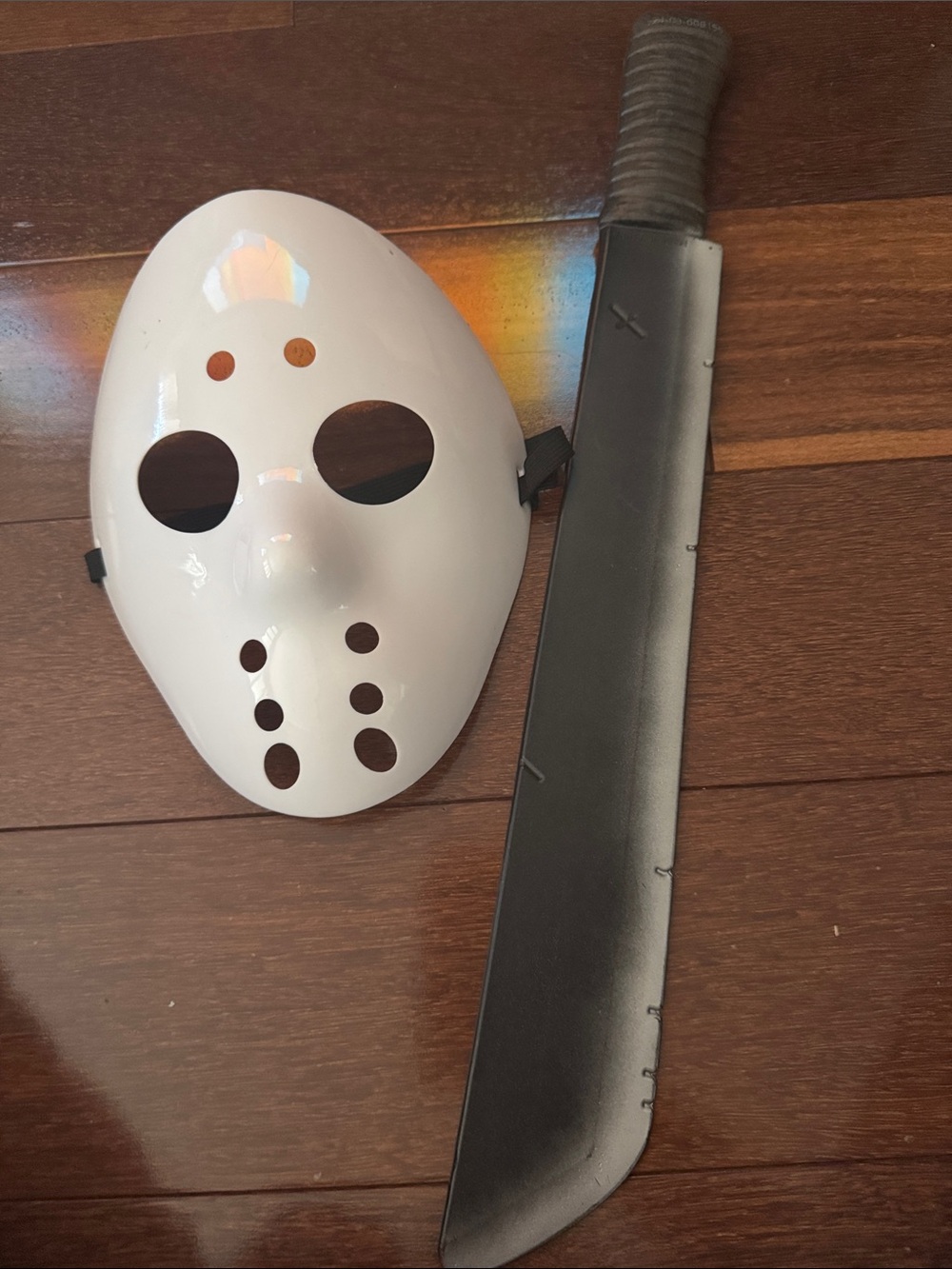 White Hockey-Style Mask and Black Prop Machete Set for Outdoor Games